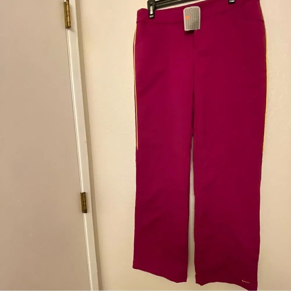 Nike womans hot pink Tech Marching Band Pants hot pink yellow pinstripe M 8-10